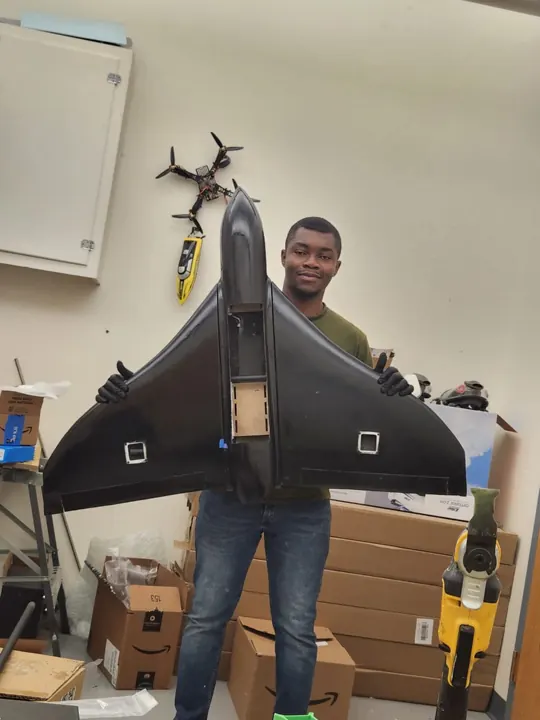 Black flying wing in the workshop
